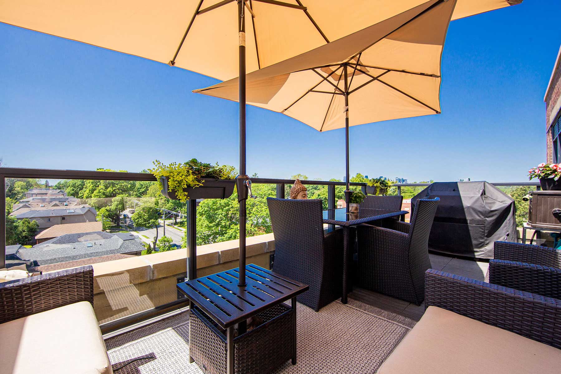 Bright sunny outdoor terrace space at 605-3 Southvale Drive.