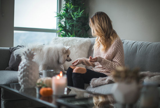 Woman relaxing after a successful open house to sell her home.