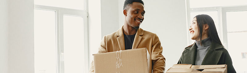 First-Time home buyers moving into new home.