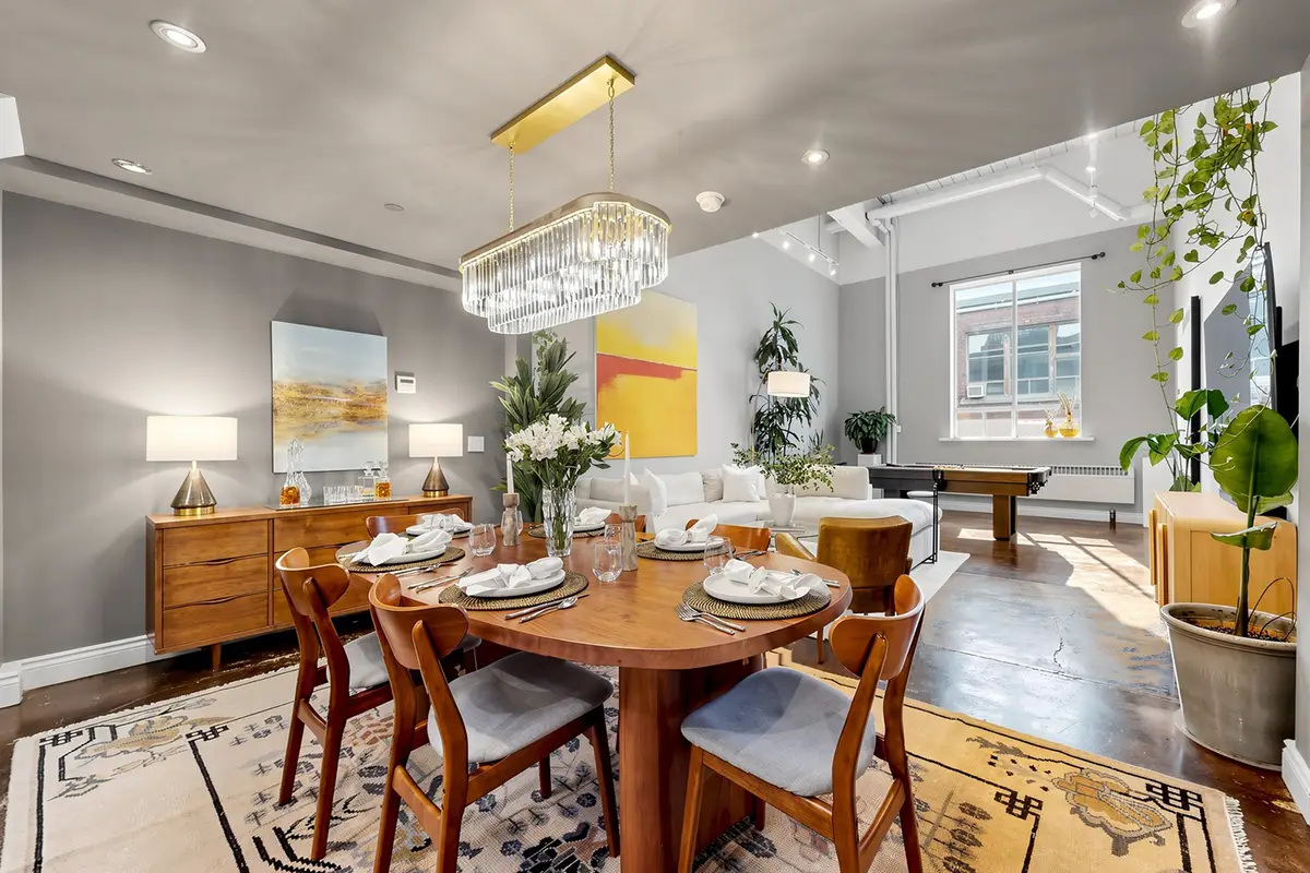 https://shirriffwells.com/wp-content/uploads/2026/10/108-326-Carlaw-Ave_Dining-Living-Room_SLIDE.webp